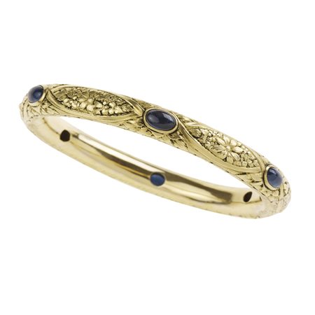 BRACCIALE RIGIDO IN ORO GIALLO E ZAFFIRI a canna vuota in oro giallo decorato...