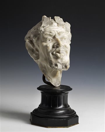 ARTISTA DEL XVIII SECOLO  Testa di fauno in marmo scolpito.