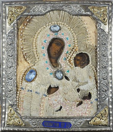 Icona dipinta su tavola raffigurante Madonna con bambino, riza in argento...