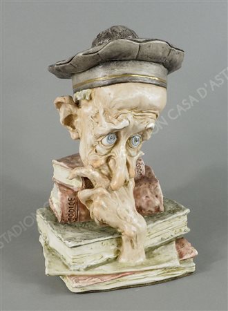 Scultura in terracotta dipinta raffigurante azzeccagarbugli con libri....