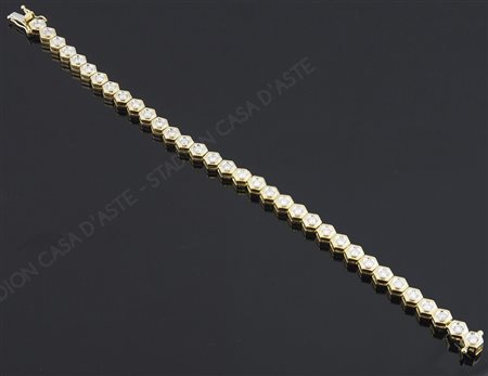 Bracciale tennis in oro giallo con diamanti incassati per tot ca 1,50.