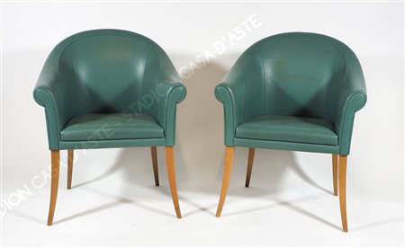 Poltrona Frau: coppia di poltrone modello Sinan in pelle verde e gambe in...