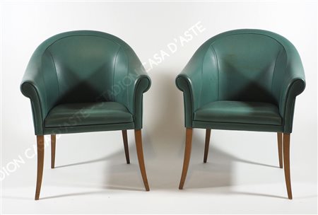 Poltrona Frau: coppia di poltrone modello Sinan in pelle verde e gambe in...