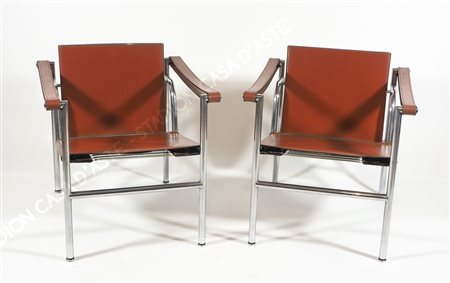 Cassina: coppia di poltrone modello LC1 cromate e rivestite in cuoio. Disegno...