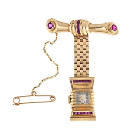 SPILLA-OROLOGIO, FINE ANNI '40, IN ORO 10 K E RUBINI SINTETICI formata da due...