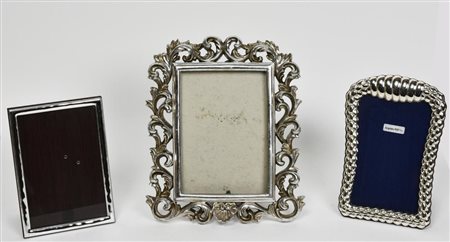 LOTTO DI 2 CORNICI IN ARGENTO 925 E UNA IN RESINA cm 17x126, 20x13,5 e 26x20