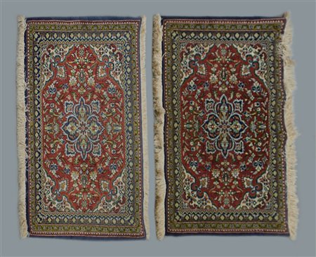 Lotto di due tappeti Qum, Persia, secolo XX (cm 89x71; cm 87x72) (difetti)