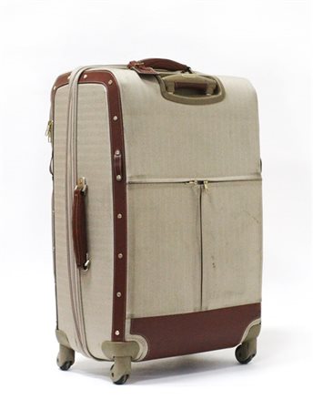 SAMSONITE
Grande valigia trolley in tessuto spinato beige rifinita in pelle col