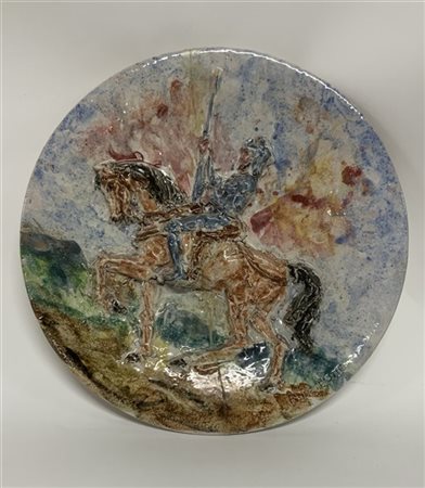 Piatto in ceramica decorato in rilievo e policromia raffigurante San Giorgio a