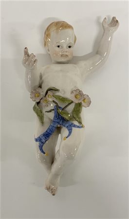 Scultura in ceramica policroma raffigurante un putto (cm h 36)