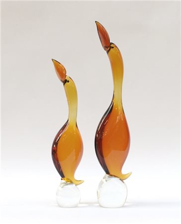 La Murrina Coppia di sculture in vetro ambrato e incolore massello raffiguranti