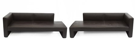 Coppia di divani a due posti rivestiti in eco pelle marrone. Produzione Matteo