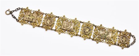 BRACCIALE IN OTTONE DORATO CON PLACCHE IN ARGENTO DI GUSTO NEOCLASSICO Italia...