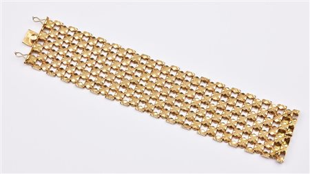 BRACCIALE IN ORO GIALLO 18 K con lavorazione a maglie esagonali incrociate e...