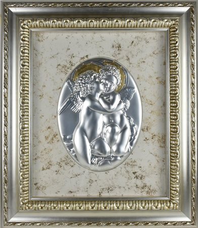 PUTTI bassorilievo in metallo argentato sbalzato e di forma ovale entro...