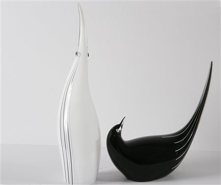 ANONIMO Lotto composto da due opere in vetro. Vetro. Pinguino bianco...