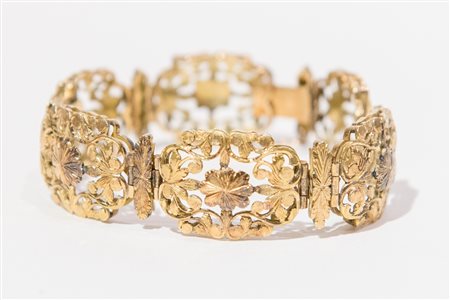 BRACCIALE IN ORO GIALLO 14K Costituito da sei formelle rettangolari traforate...