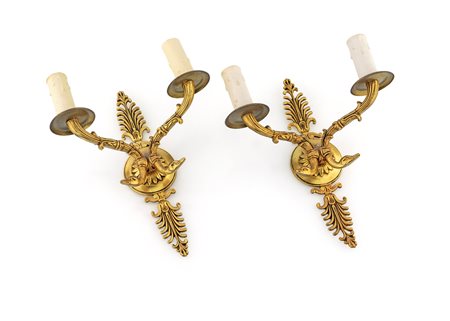 Coppia di appliques in bronzo dorato a due luci