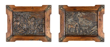 Coppia di bassorilievi in rame sbalzato