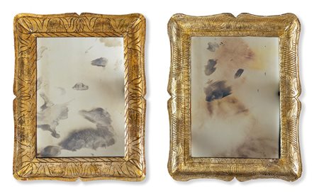Due cornici a guantiera in legno dorato con specchi