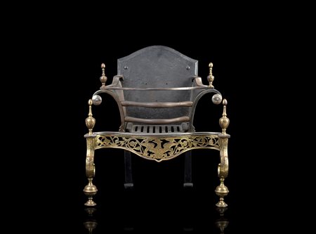 Portalegna in ferro e ottone traforato e inciso a volute e aquila ad ali spiega