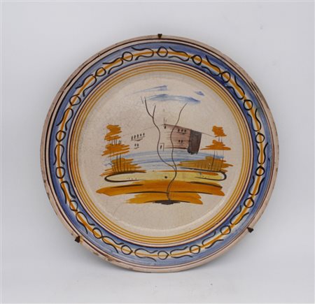 Piatto in terraglia smaltata -  A glazed earthenware dish