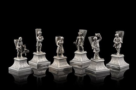 Gruppo di sei porta stuzzicadenti in argento raffiguranti le maschere della Commedia dell'Arte 