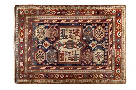 Tappeto Kazak Fachralo, Caucaso, secolo XIX.
Decoro con medaglione a fondo bian