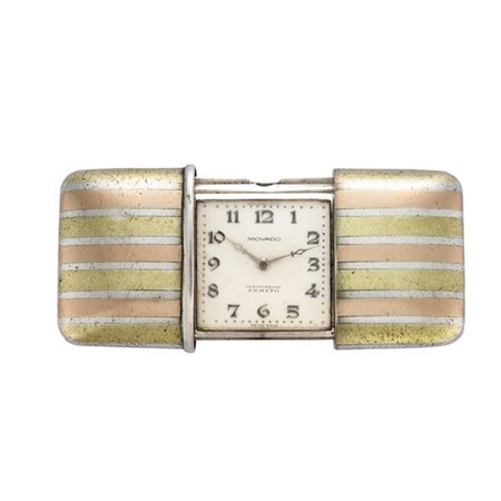 MOVADO ERMETO
Orologio da tasca in argento con cassa a tre colori
Epoca prima m