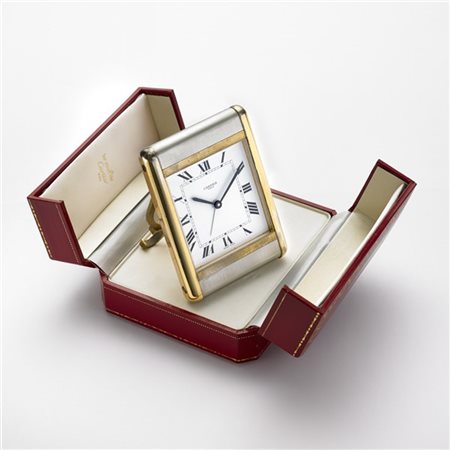 CARTIER
Orologio da viaggio in metallo bianco e dorato
Anni '80
Quadrante, movi