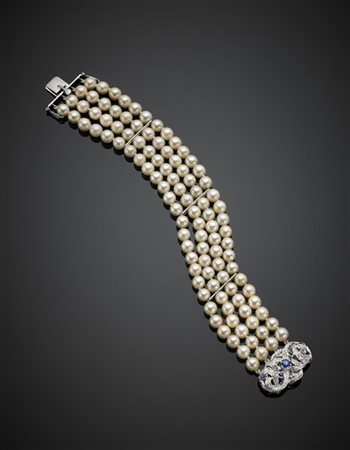 Bracciale a quattro fili di perle bianche coltivate di diam. mm 5,50 circa con