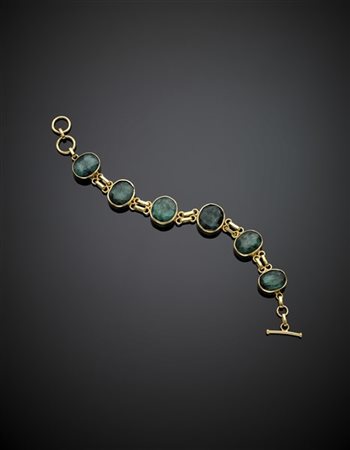 Bracciale in oro giallo con gemme verdi ovali, g 39,40 circa, lungh. cm 19,80 c
