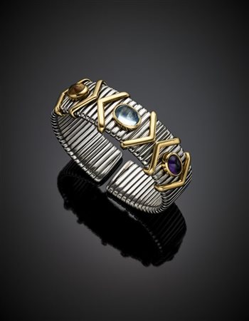 Bracciale in acciaio rifinito con oro e pietre cabochon, lordi g 68 circa, diam