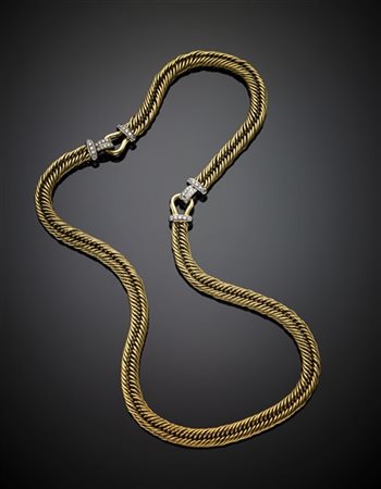 POMELLATO
Demi-parure in oro giallo e bianco con piccoli diamanti composta da c