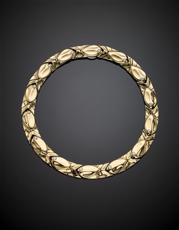 *CUSI
Collier in oro giallo a quattordici moduli a forma di pesce rifiniti con