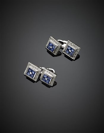 Gemelli in oro bianco rifiniti con zaffiri e diamanti, g 10,80 circa. Marcati 9