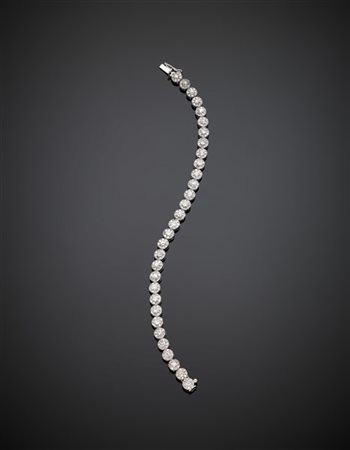 Bracciale in oro bianco, diamanti rotondi e old mine per complessivi ct. 4 circ