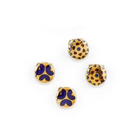 Quattro copribottoni in oro giallo 18K e smalto