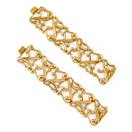 Due bracciali in oro giallo scatolato 18K