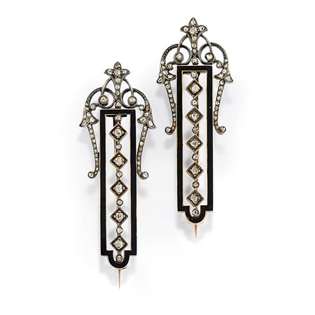 Coppia di spille in argento