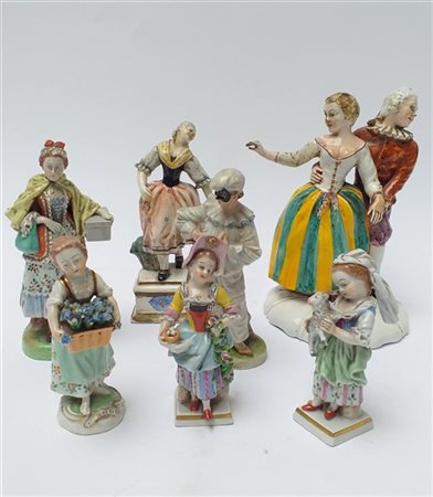 Manifatture ed epoche diverse, lotto di sette sculturine in porcellana policrom