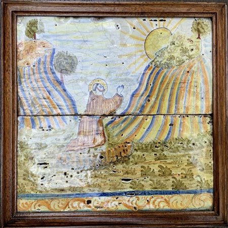 Due piastrelle in maiolica policroma raffiguranti San Francesco Orante (cm 32x3