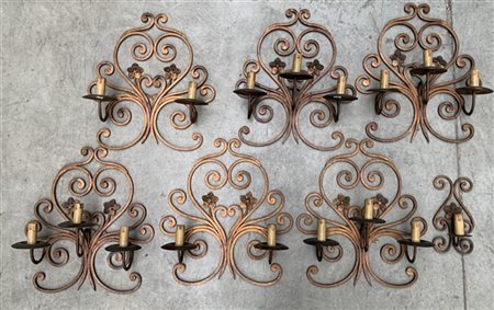 Lotto composto da quattro appliques a tre fiamme unite a tre differenti (difett