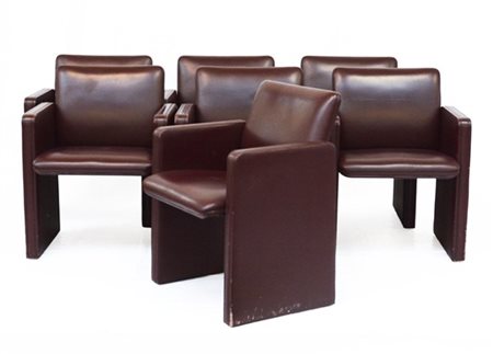 Poltrona Frau Lotto composto da sette poltrone a rotelle con struttura in legno,