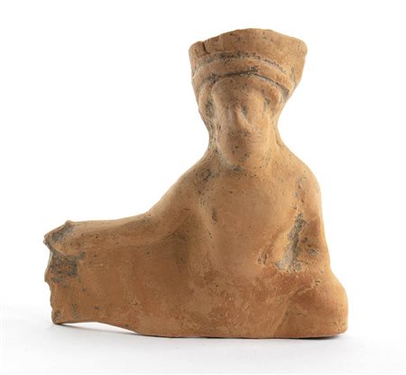 DIONISO SDRAIATO SULLA KLINE<br>Magna Graecia, produzione tarantina, IV - III secolo a.C.
