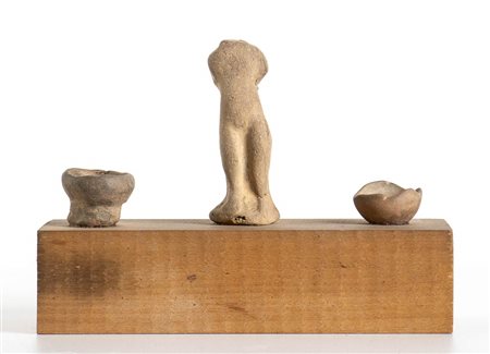 COMPOSIZIONE DI VOTIVI IN TERRACOTTA<br>IV - III secolo a.C.