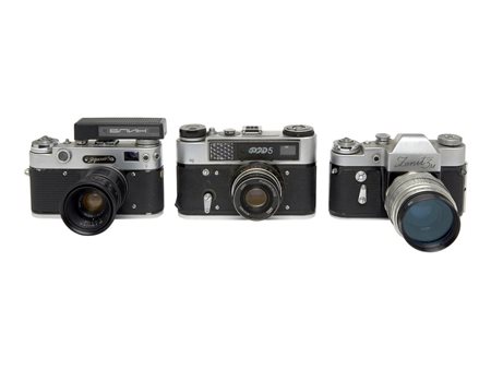 Lotto di tre macchine fotografiche Sovietiche/Russe obiettivo compreso 1....