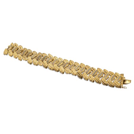 Bracciale in oro giallo satinato 18ktanni 50/60peso 67,7 gr.maglie snodabili...