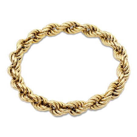 Bracciale a torchon in oro giallo 18ktanni 50/60peso 24,8 gr.diametro 7 cm.