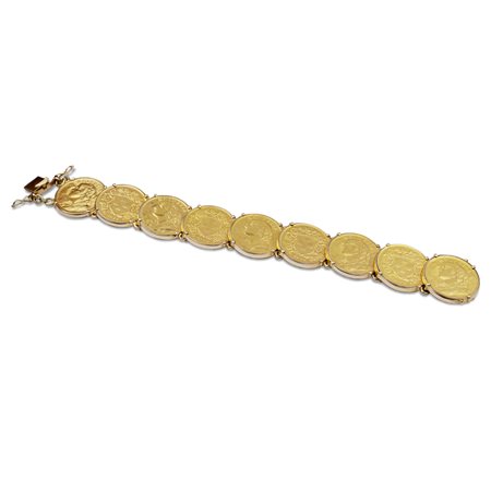 Bracciale monete in oro giallo 18ktanni 50/60peso 83 gr.con nove monete...
